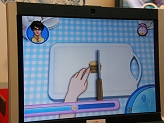 画像ギャラリー No.008のサムネイル画像 / ［CJ 2008＃43］どこかで見たような操作感のコントローラーが同梱された「eMooove games」は，PCで遊べるのが特徴らしいが？