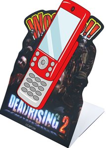 画像ギャラリー No.001のサムネイル画像 / 「デッドライジング2」イーカプコン限定のオリジナル特典はゾンビデザインのモバイルスタンドに。「屍病汚染DEAD RISING」のDVDは11月4日に発売