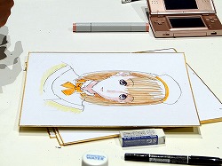 画像ギャラリー No.014のサムネイル画像 / ［TGS 2009］“自分の彼女”の似顔絵をミノ☆タロー氏に書いてもらえる抽選イベントも。「ラブプラス」の「デキシーズ 幕張出張所」レポート