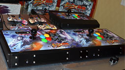 画像ギャラリー No.001のサムネイル画像 / Mad Catz,「ストリートファイター×鉄拳」仕様のアーケードスティックを正式発表。最上位モデルは2台の連結が可能に