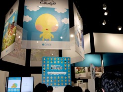 画像ギャラリー No.009のサムネイル画像 / ［TGS 2011］GREEの巨大ブースに老若男女を問わず，人々が押し寄せる。「ドラゴンコレクション」のシリアルコード配布には長蛇の列