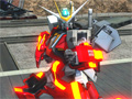 ［AOU2012］「機動戦士ガンダム エクストリームバーサス フルブースト」ステージレポート。岡本信彦さんと竹達彩奈さんの，作品にかける思いとは