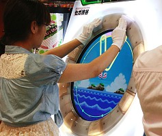 画像ギャラリー No.001のサムネイル画像 / 「maimaiGreeN」,持参した手袋をはめて高得点を狙うプレイヤーとは