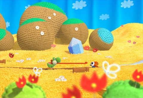 画像ギャラリー No.001のサムネイル画像 / ［E3 2014］2015年発売予定のWii U「Yoshi's Woolly World」では，編みぐるみ姿のヨッシーが毛糸を生かしたアクションで活躍。2人プレイではヨッシー同士で“食べ合い”ができる？