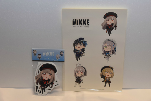 画像ギャラリー No.012のサムネイル画像 / 「勝利の女神:NIKKE」ブースはリアル10連ガチャが熱かった! コミックマーケット102会場を彩った広告も一挙紹介